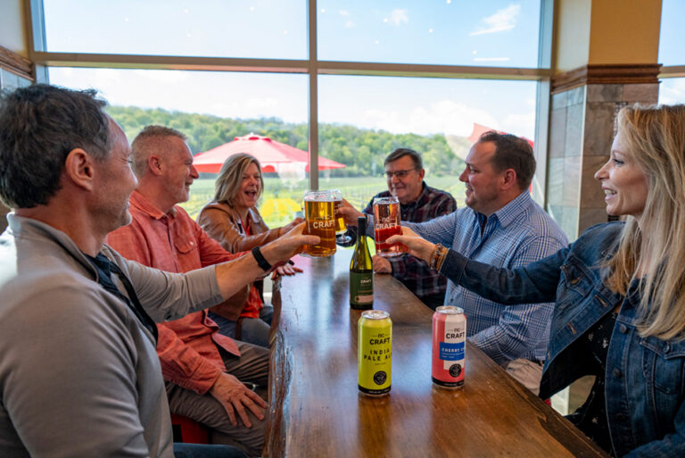 People enjoying beverages in the tasting room